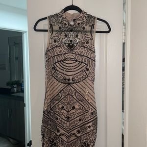 Nude and black sequin dress